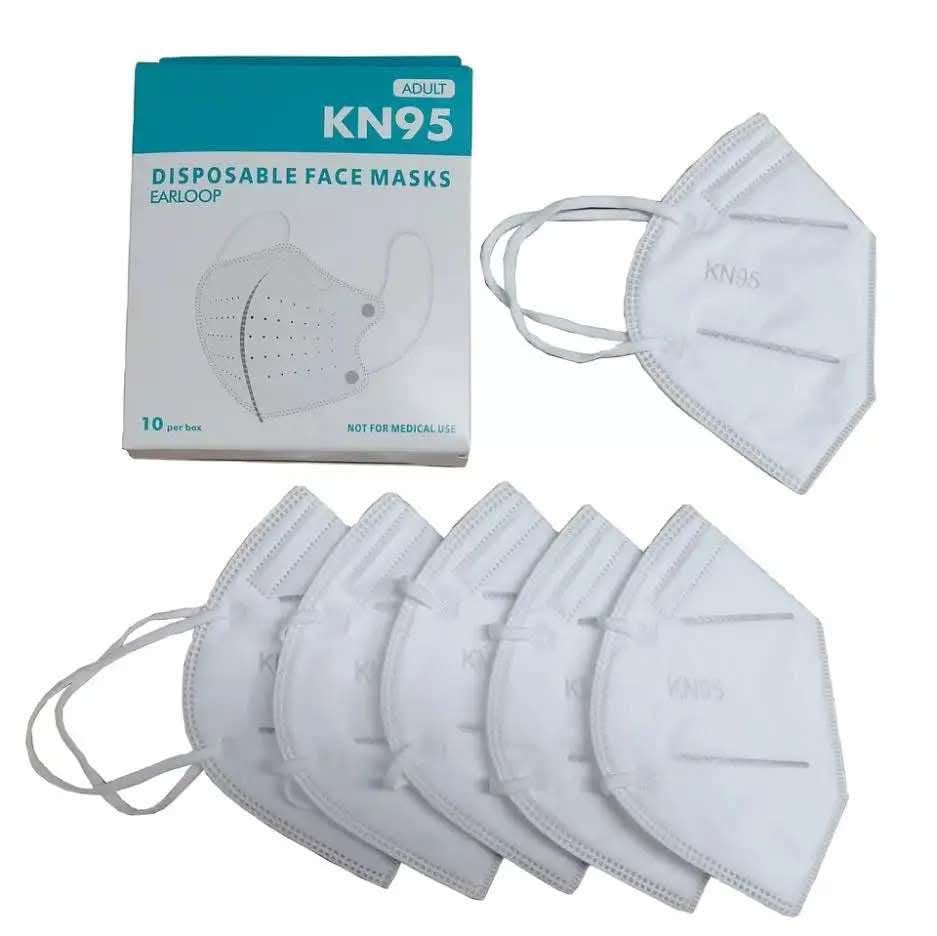 Close-up of a white KN95 mask with ear loops
