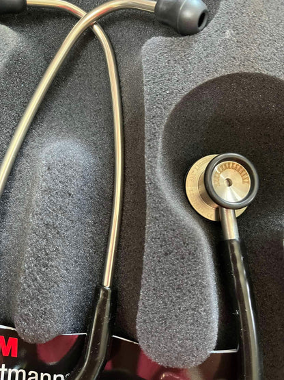 Close-up of Littmann Pediatric Stethoscope Black with mis-engraving on tubing
